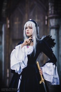 Rating: Safe Score: 0 Tags: 1girl blurry blurry_background depth_of_field dress lips long_hair long_sleeves solo standing suigintou sword weapon white_hair User: admin