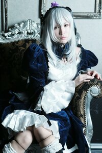 Rating: Safe Score: 0 Tags: 1girl dress frills lips long_hair long_sleeves photo sitting solo suigintou white_hair User: admin