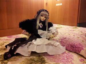 Rating: Safe Score: 0 Tags: 1girl bangs doll dress flower frills lips long_hair long_sleeves sitting solo suigintou User: admin