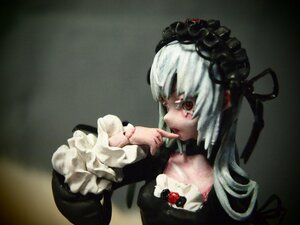 Rating: Safe Score: 0 Tags: 1girl bangs black_dress choker doll dress finger_to_mouth flower frills gothic_lolita lolita_fashion long_hair long_sleeves photo red_eyes rose solo suigintou traditional_media upper_body User: admin
