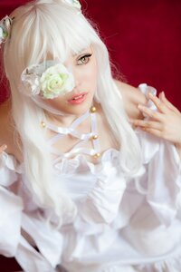 Rating: Safe Score: 0 Tags: 1girl bandages blurry blurry_foreground choker depth_of_field dress flower hair_flower hair_ornament kirakishou lace lips long_hair red_background red_lips solo white_flower white_hair white_rose yellow_eyes User: admin