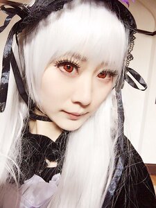 Rating: Safe Score: 0 Tags: 1girl bangs closed_mouth face lips long_hair looking_at_viewer portrait red_eyes ribbon smile solo suigintou white_hair User: admin