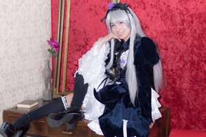 Rating: Safe Score: 0 Tags: 1girl black_footwear boots dress flower frills gothic_lolita hairband lips long_hair long_sleeves looking_at_viewer realistic silver_hair sitting solo suigintou User: admin