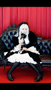 Rating: Safe Score: 0 Tags: 1girl black_footwear boots curtains dress frills gothic_lolita high_heels letterboxed lolita_fashion long_hair nail_polish red_eyes sitting solo suigintou white_hair User: admin