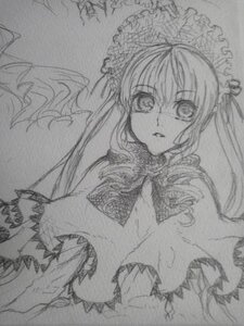 Rating: Safe Score: 0 Tags: 1girl bonnet dress frills greyscale image long_hair long_sleeves looking_at_viewer monochrome shinku sketch solo traditional_media twintails upper_body User: admin