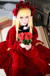 Rating: Safe Score: 0 Tags: 1girl bangs blonde_hair blue_eyes bouquet dress flower holding lips long_hair looking_at_viewer photo red_dress rose shinku sitting solo User: admin