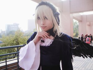 Rating: Safe Score: 0 Tags: 1girl blonde_hair building city dress long_hair outdoors solo suigintou upper_body User: admin