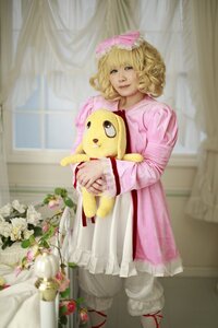 Rating: Safe Score: 0 Tags: 1girl blonde_hair blurry curly_hair curtains dress flower hairband hinaichigo pink_dress realistic solo standing stuffed_animal User: admin