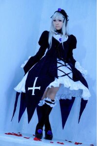 Rating: Safe Score: 0 Tags: 1girl auto_tagged black_dress blue_background blurry dress frills full_body gothic_lolita hairband long_hair long_sleeves puffy_sleeves solo standing suigintou User: admin