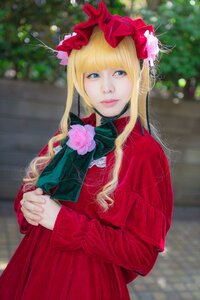 Rating: Safe Score: 0 Tags: 1girl bangs blonde_hair blue_eyes blurry blurry_background depth_of_field dress flower hands_together interlocked_fingers lips long_hair looking_at_viewer own_hands_together realistic red_capelet red_dress red_flower red_rose rose shinku solo upper_body User: admin
