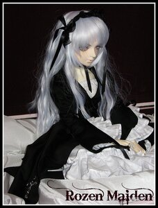 Rating: Safe Score: 0 Tags: 1girl black_border doll doll_joints dress frills gothic_lolita hairband joints letterboxed long_hair long_sleeves pillarboxed sitting solo suigintou User: admin