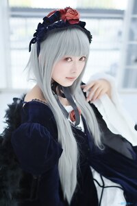 Rating: Safe Score: 0 Tags: 1girl bangs blurry blurry_background closed_mouth depth_of_field dress flower gothic_lolita hairband indoors lace lolita_fashion long_hair long_sleeves looking_at_viewer red_eyes red_flower red_rose rose silver_hair solo suigintou User: admin