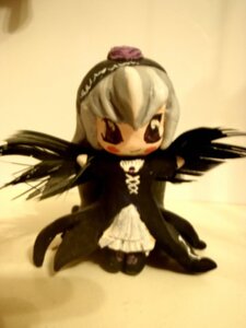 Rating: Safe Score: 0 Tags: 1girl black_dress black_wings blonde_hair blurry chibi doll dress frills full_body hairband long_hair long_sleeves looking_at_viewer simple_background solo suigintou wings User: admin