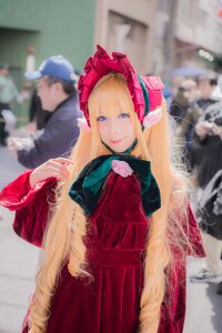 Rating: Safe Score: 0 Tags: 1girl bangs blonde_hair blue_eyes blurry blurry_background blurry_foreground bonnet depth_of_field dress long_hair looking_at_viewer photo red_dress shinku smile solo solo_focus very_long_hair User: admin