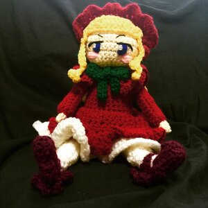 Rating: Safe Score: 0 Tags: black_background doll full_body long_sleeves scarf shinku sitting solo User: admin