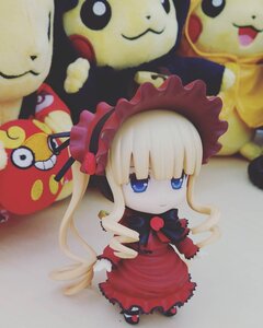 Rating: Safe Score: 0 Tags: 1girl blonde_hair blue_eyes bow doll dress long_hair long_sleeves looking_at_viewer photo red_dress shinku solo twintails User: admin