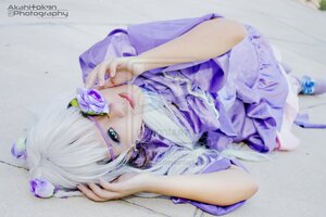 Rating: Safe Score: 0 Tags: 1girl artist_name bangs barasuishou blue_eyes blurry bug butterfly depth_of_field dress eyepatch flower insect lips looking_at_viewer lying purple_nails solo white_hair User: admin