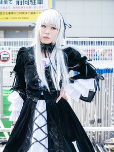 Rating: Safe Score: 0 Tags: 1girl bangs black_dress dress long_hair long_sleeves looking_at_viewer photo ribbon solo standing suigintou white_hair User: admin