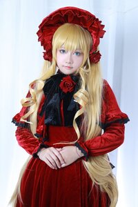 Rating: Safe Score: 0 Tags: 1girl blonde_hair blue_eyes bonnet cowboy_shot dress flower lips long_hair long_sleeves looking_at_viewer red_dress red_flower red_rose rose shinku solo User: admin