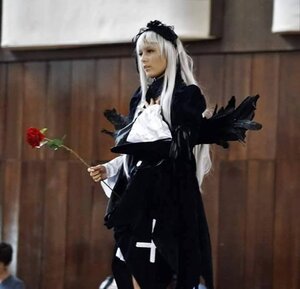 Rating: Safe Score: 0 Tags: 1girl black_dress blurry depth_of_field dress flower frills gothic_lolita holding indoors lolita_fashion long_hair long_sleeves photo red_flower rose solo standing suigintou very_long_hair white_hair wings User: admin