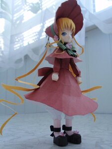 Rating: Safe Score: 0 Tags: 1girl blonde_hair blue_eyes bonnet bow bowtie doll dress full_body green_bow green_neckwear long_hair long_sleeves looking_at_viewer outdoors photo red_dress shinku sidelocks solo standing User: admin