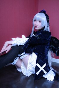 Rating: Safe Score: 0 Tags: 1girl bangs closed_mouth frills gothic_lolita lips lolita_fashion long_hair long_sleeves sitting solo suigintou thighhighs User: admin