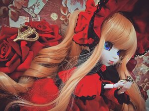 Rating: Safe Score: 0 Tags: 1girl blonde_hair blue_eyes bow doll flower lips long_hair red_flower red_rose rose shinku solo User: admin