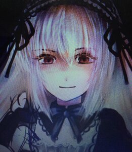 Rating: Safe Score: 0 Tags: 1girl bangs black_ribbon bow closed_mouth dress eyebrows_visible_through_hair frills hairband image looking_at_viewer ribbon smile solo suigintou User: admin