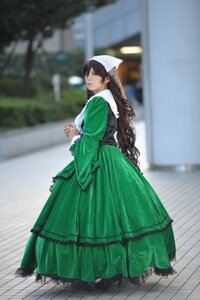 Rating: Safe Score: 0 Tags: 1girl blurry blurry_background brown_hair day depth_of_field dress full_body green_dress long_hair long_sleeves looking_at_viewer outdoors solo standing suiseiseki User: admin