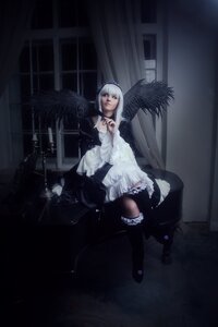 Rating: Safe Score: 0 Tags: 1girl black_wings dress feathered_wings feathers frills indoors long_hair looking_at_viewer ribbon sitting solo suigintou white_dress white_hair window wings User: admin
