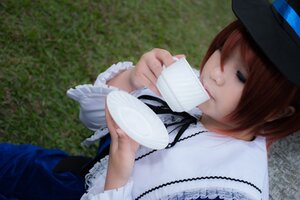 Rating: Safe Score: 0 Tags: 1girl blurry brown_hair cup depth_of_field frills hat holding holding_cup long_sleeves saucer short_hair solo souseiseki tea teacup User: admin