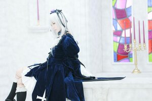 Rating: Safe Score: 0 Tags: 1girl boots dress frills hair_ornament long_sleeves photo solo standing suigintou sword weapon white_hair User: admin
