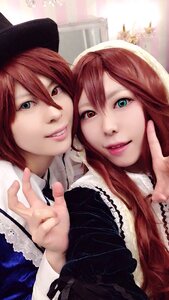 Rating: Safe Score: 0 Tags: 2girls green_eyes hair_between_eyes hat heterochromia lips long_hair looking_at_viewer multiple_cosplay multiple_girls red_eyes red_hair siblings sisters smile souseiseki tagme twins v User: admin