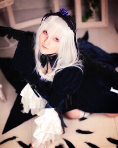Rating: Safe Score: 0 Tags: 1girl blurry blurry_background blurry_foreground depth_of_field detached_collar dress figure flower frills hairband lips long_hair long_sleeves looking_at_viewer photo red_eyes silver_hair solo solo_focus suigintou wings User: admin