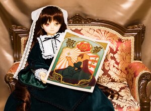 Rating: Safe Score: 0 Tags: 1girl brown_hair doll dress frills heterochromia long_hair long_sleeves painting_(object) red_eyes sitting solo suiseiseki User: admin