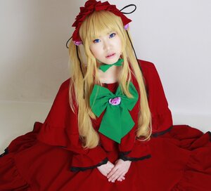 Rating: Safe Score: 0 Tags: 1girl blonde_hair blue_eyes bow bowtie capelet dress flower lips long_hair realistic red_dress ribbon rose shinku solo User: admin