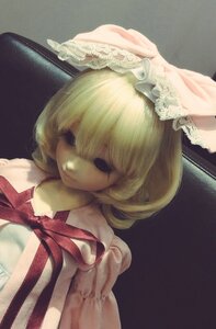 Rating: Safe Score: 0 Tags: 1girl bangs blonde_hair doll dress hinaichigo ribbon short_hair solo upper_body User: admin