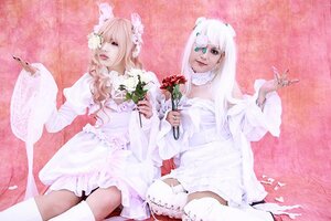 Rating: Safe Score: 0 Tags: 2girls dress flower hair_ornament kirakishou long_hair multiple_girls pink_hair sitting solo striped thighhighs vertical_stripes white_dress white_hair User: admin