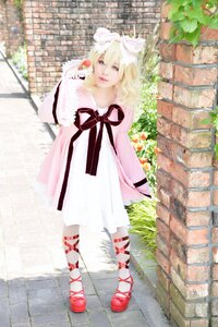 Rating: Safe Score: 0 Tags: 1girl blonde_hair brick_wall dress fence hinaichigo pantyhose pavement red_footwear ribbon shoes solo standing tiles wall User: admin