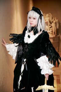 Rating: Safe Score: 0 Tags: 1girl bird black_dress black_feathers black_wings closed_mouth dress feathered_wings feathers frills gothic_lolita hairband lips long_sleeves looking_at_viewer red_eyes ribbon rose silver_hair solo standing suigintou wings User: admin