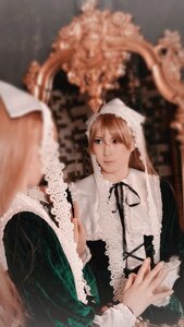 Rating: Safe Score: 0 Tags: bangs blurry blurry_background blurry_foreground brown_hair depth_of_field dress frills green_eyes long_sleeves ribbon solo suiseiseki User: admin