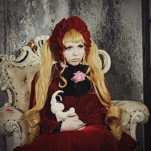 Rating: Safe Score: 0 Tags: 1girl bangs blonde_hair blue_eyes bonnet chair dress flower long_hair long_sleeves looking_at_viewer red_dress shinku sitting solo User: admin