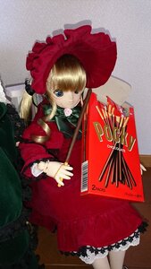 Rating: Safe Score: 0 Tags: 1girl blonde_hair blue_eyes bonnet bow doll dress flower frills instrument long_hair long_sleeves looking_at_viewer red_dress rose shinku solo twintails User: admin