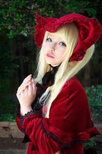 Rating: Safe Score: 0 Tags: 1girl bangs blonde_hair blue_eyes blurry blurry_background bonnet dress flower hands_together lace lips long_hair long_sleeves looking_at_viewer outdoors parted_lips realistic red_dress shinku solo upper_body User: admin