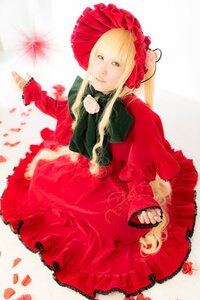 Rating: Safe Score: 0 Tags: 1girl blonde_hair blue_eyes bonnet dress flower long_sleeves petals red_dress red_flower red_rose rose shinku solo User: admin