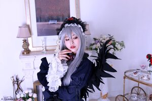 Rating: Safe Score: 0 Tags: 1girl dress flower frills gothic_lolita lips lipstick lolita_fashion long_hair long_sleeves makeup solo suigintou User: admin