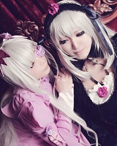 Rating: Safe Score: 0 Tags: 2girls blonde_hair bow closed_eyes closed_mouth dress flower hairband lips lolita_fashion long_hair long_sleeves multiple_cosplay multiple_girls shinku silver_hair smile suigintou tagme User: admin