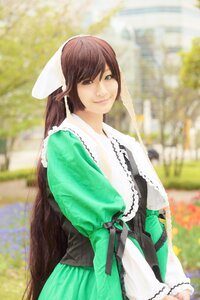 Rating: Safe Score: 0 Tags: 1girl 3d blurry blurry_background brown_hair closed_mouth depth_of_field frills green_dress green_eyes heterochromia long_hair long_sleeves looking_at_viewer outdoors photo_background smile solo suiseiseki very_long_hair wide_sleeves User: admin