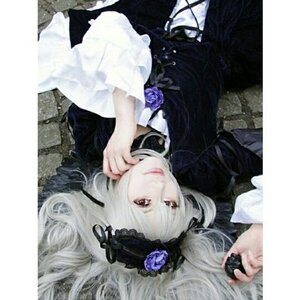 Rating: Safe Score: 0 Tags: 1girl dress flower hairband lolita_fashion long_hair long_sleeves looking_at_viewer ribbon rose silver_hair solo suigintou User: admin