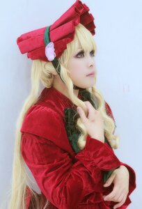 Rating: Safe Score: 0 Tags: 1girl blonde_hair blue_eyes lips long_hair long_sleeves nose profile realistic red_headwear shinku solo traditional_media upper_body User: admin